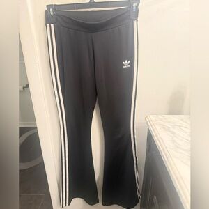 Adidas Black pants with White Stripes
Like new worn once